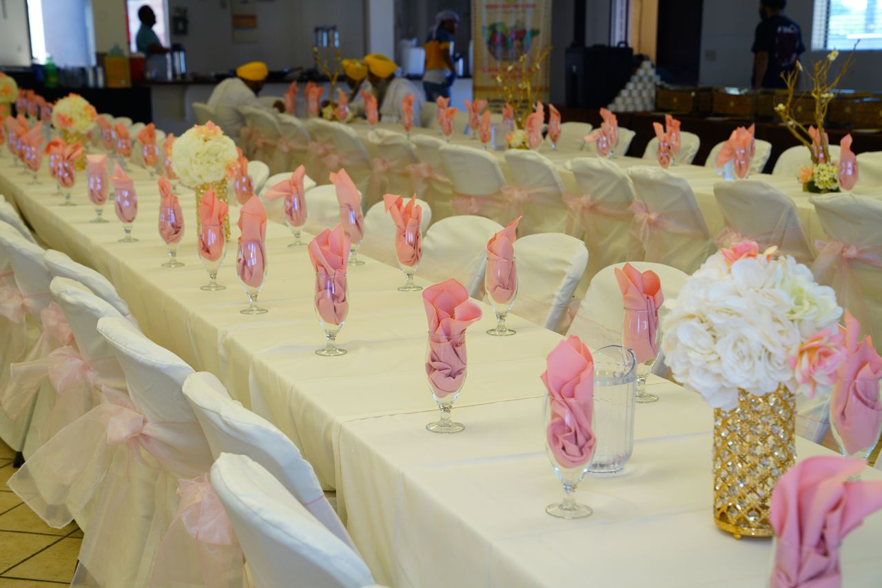 Crafting Captivating Headlines: Your awesome post title goes here Set long banquet tables in white and pink colors arranged in modern restaurant for wedding celebration